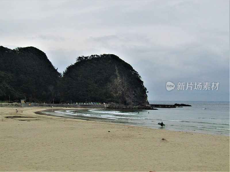 Japan. July. Sea, sand, cliffs, and sky.